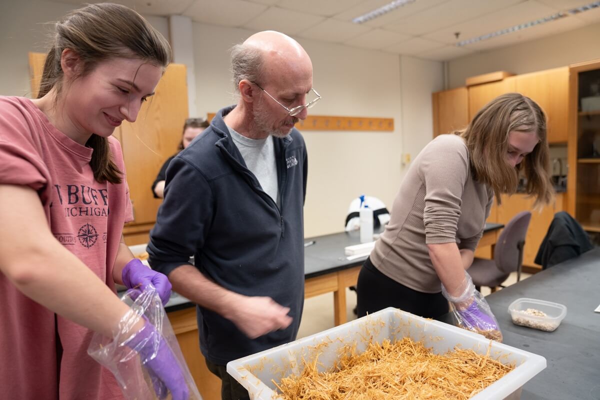 professor in classroom with students
