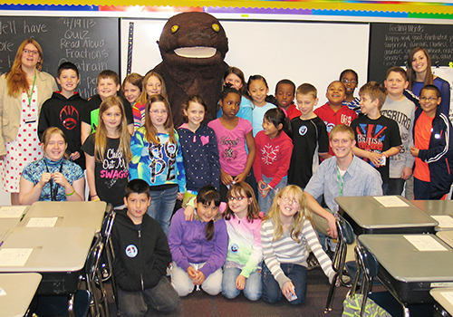 Classroom with kids and Herbie, Help the Hellbender curriculum.