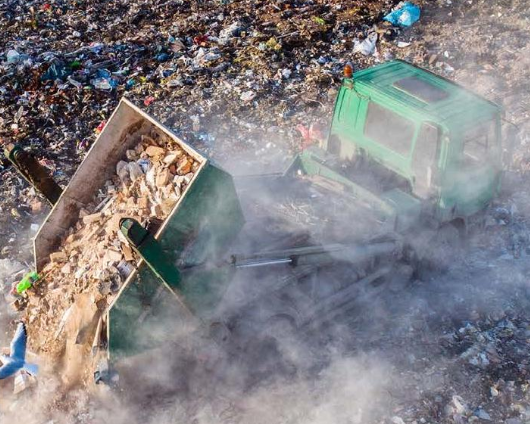Truck in landfill, Food Waste & the Environment, Nature of Teaching.