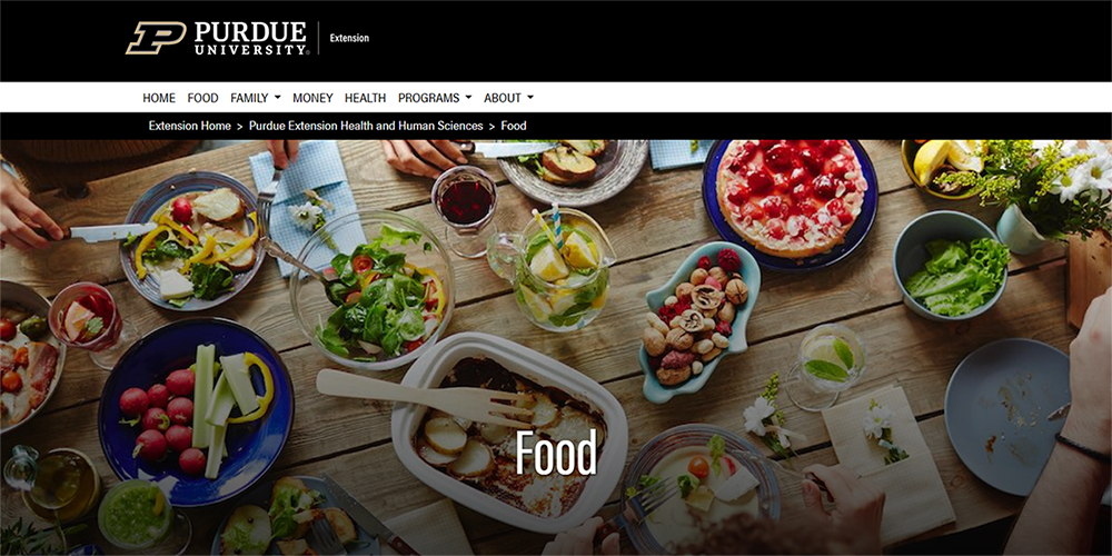 Table full of food on the Purdue Extensions Health and Human Services website