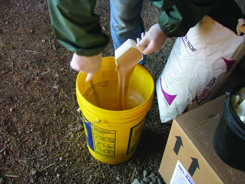 mixing granulated mixer in a bucket