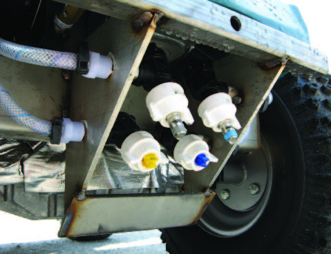 multiple nozzles at the front of the sprayer