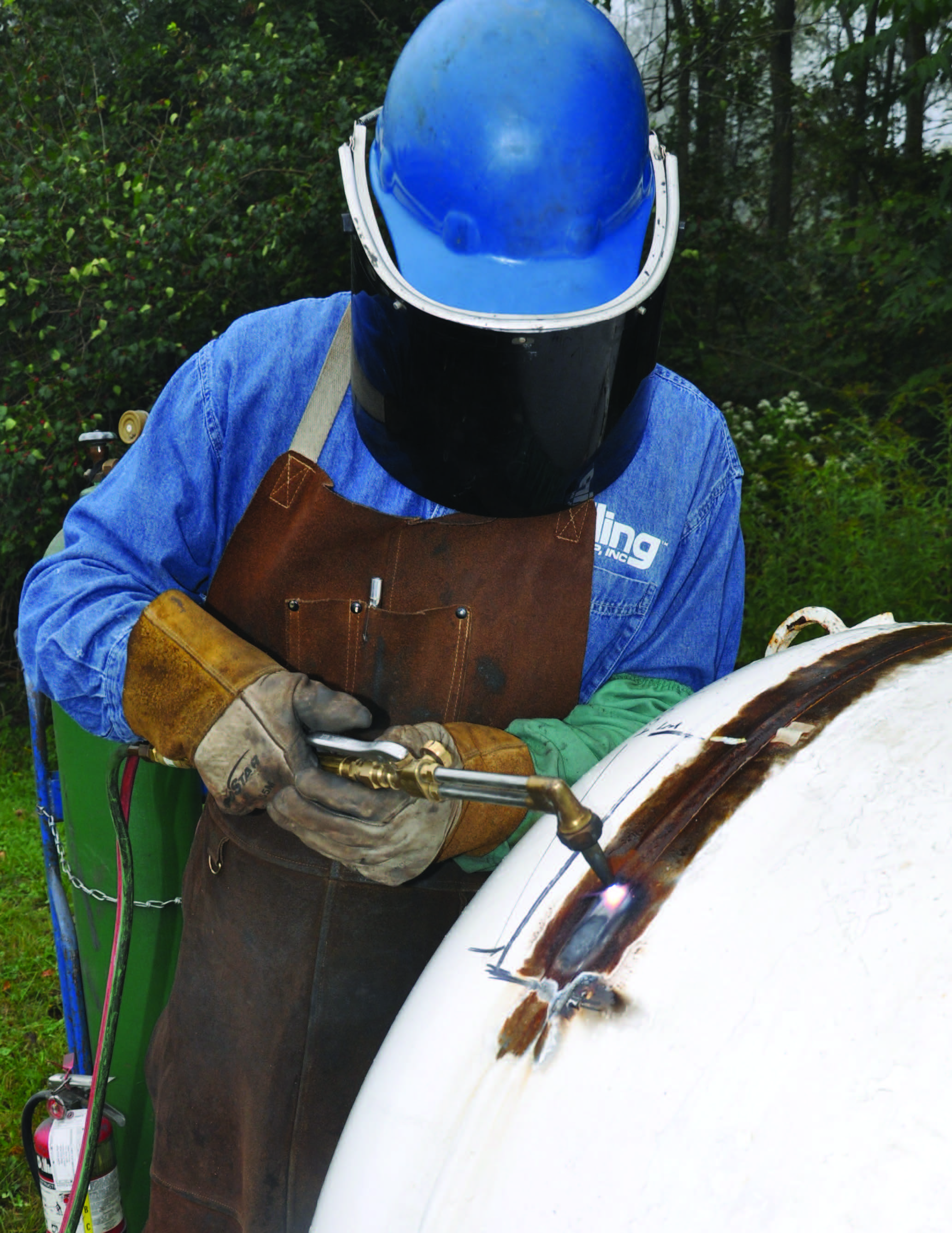 man-welding-tank.jpg