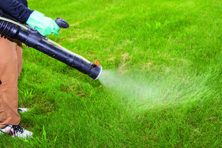 Applying insecticides into managed turf wastes material 