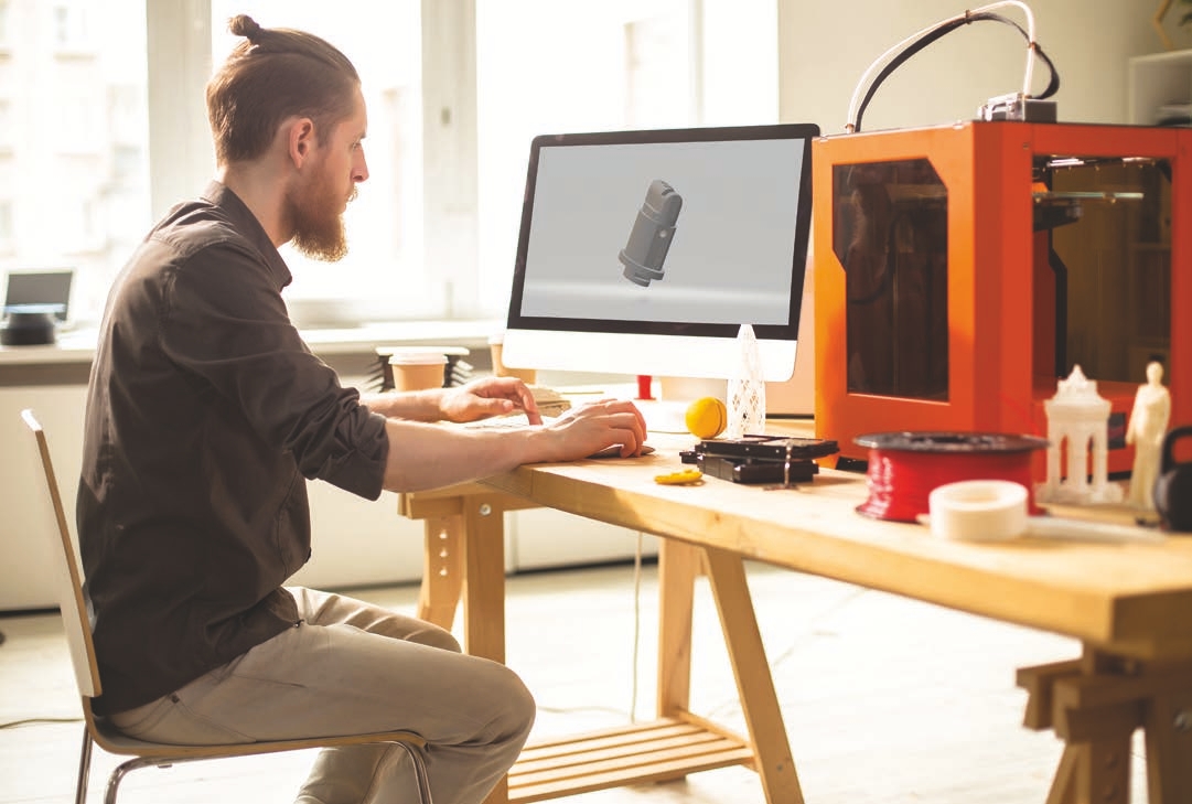 Person working on a desktop in an office