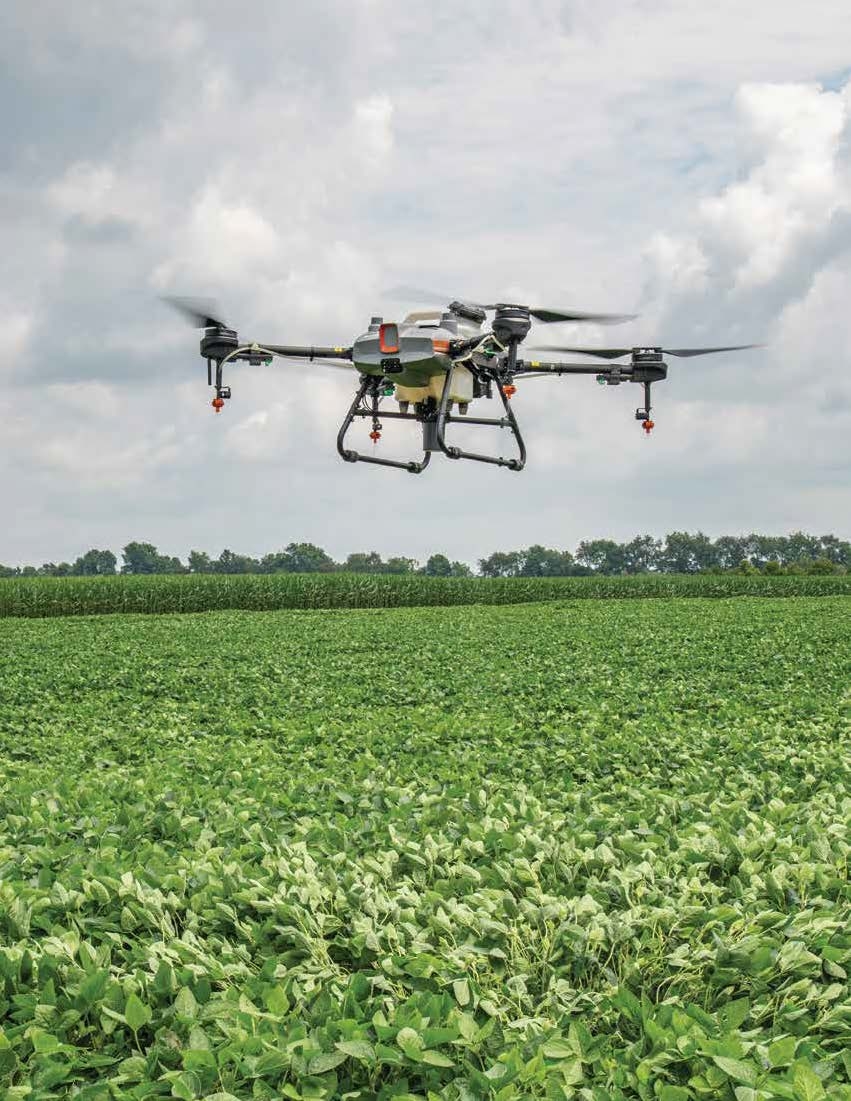 drone flying over crop field