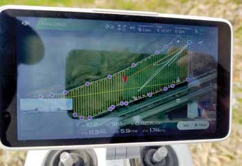 This is an example of the software available with many drones. This image shows an application in progress after the operator developed a detailed flight plan. Yellow lines indicate the drone’s flight paths. Each purple dot is a waypoint that indicates a change in the application boundary, which signal the drone to change direction.