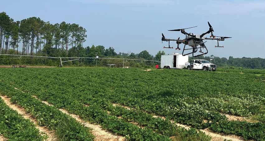 drone flying over a field