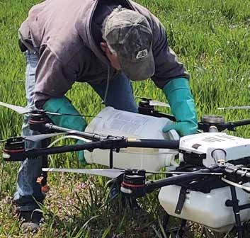 It is important to wear chemical-resistant gloves when handling spray drones because the aircraft exterior will have pesticide residues.