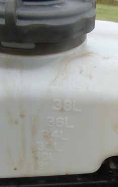 Several spray tanks have labels that indicate different volumes, which can be helpful for accurate mixing. This 38-liter tank is equivalent to 10 gallons.