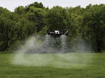 This photo shows the spray distribution and swath emitted from a DJI Agras T40 using rotary atomizer (spinning disc) nozzles.