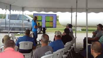 A person presenting to a crowd