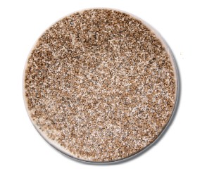 The different colors in this fertilizer mix are examples of nitrogen, phosphorus, and potassium granules that have been mixed together to come up with the formula written on the fertilizer bag.