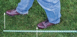 Measuring the distance from to the front shoe to the back shoe. 