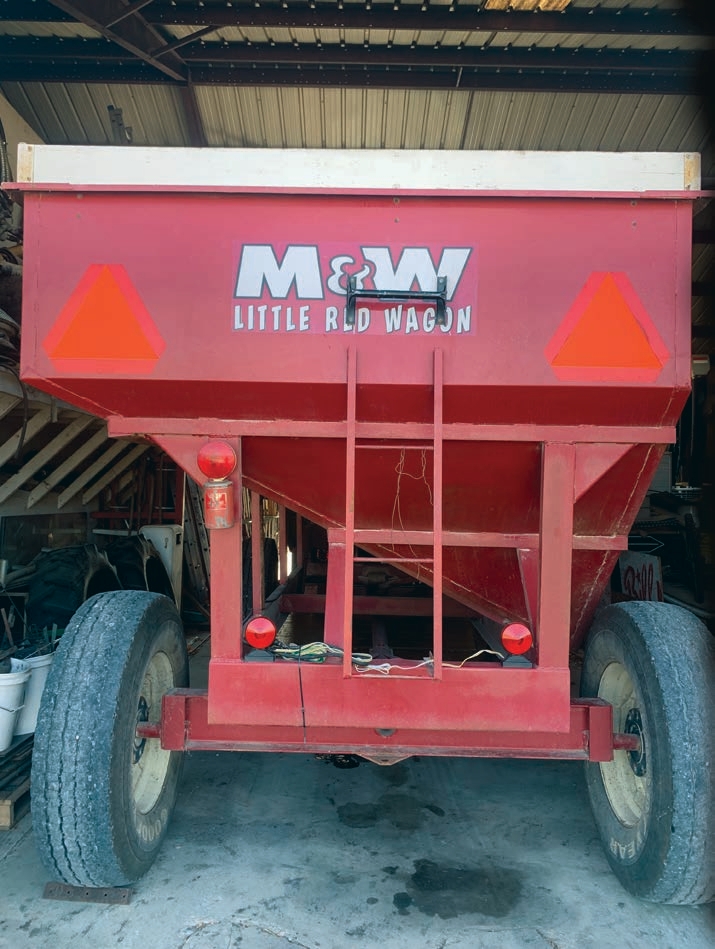 This wagon has rear warning lights as well as two slow-moving vehicle signs.