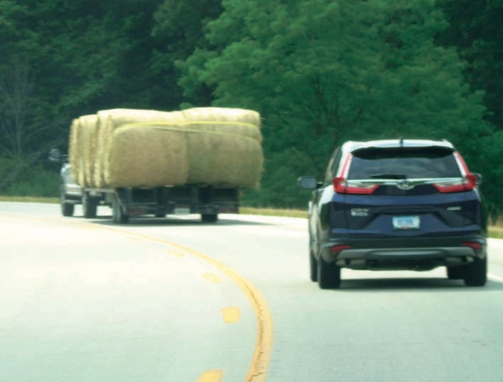 Truck hay load not secured properly