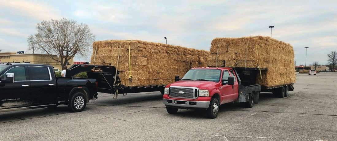 Properly placed straps that run across the top of a load may secure bales from shifting from side-to-side.