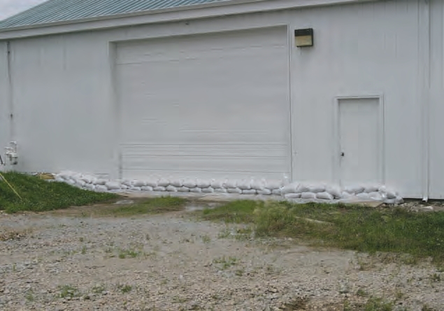 You can also build temporary dikes around buildings to help protect them.