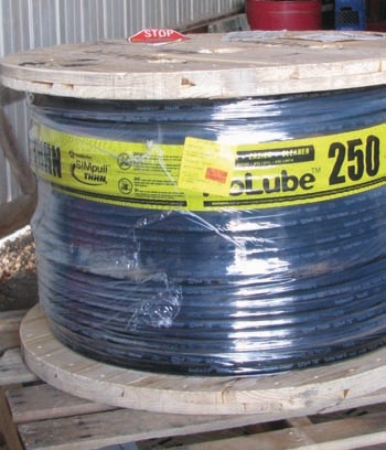 An example of storing a hose on its reel. Extreme temperature and humidity fluctuations might reduce the life of the hose.