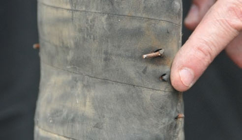 Kinking can permanently pinch the wire braid in hoses.