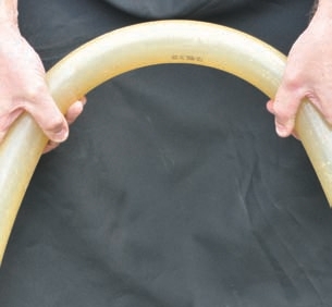 When clear tubing is discolored, the safest approach is to replace it.