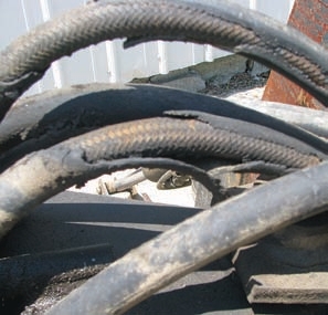 When oil or grease remain on a hose, it can create soft spots that weaken a hose’s integrity.