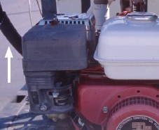 Another hose helps shield the pressure carrying hose from the heat of the engine.