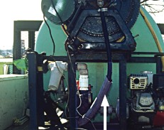 Another hose helps shield the pressure carrying hose from the heat of the engine.