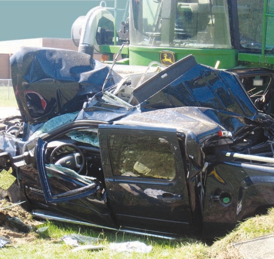The driver of this pickup ran a stop sign and drove into the combine’s feeder. The driver of the vehicle was lucky to survive.