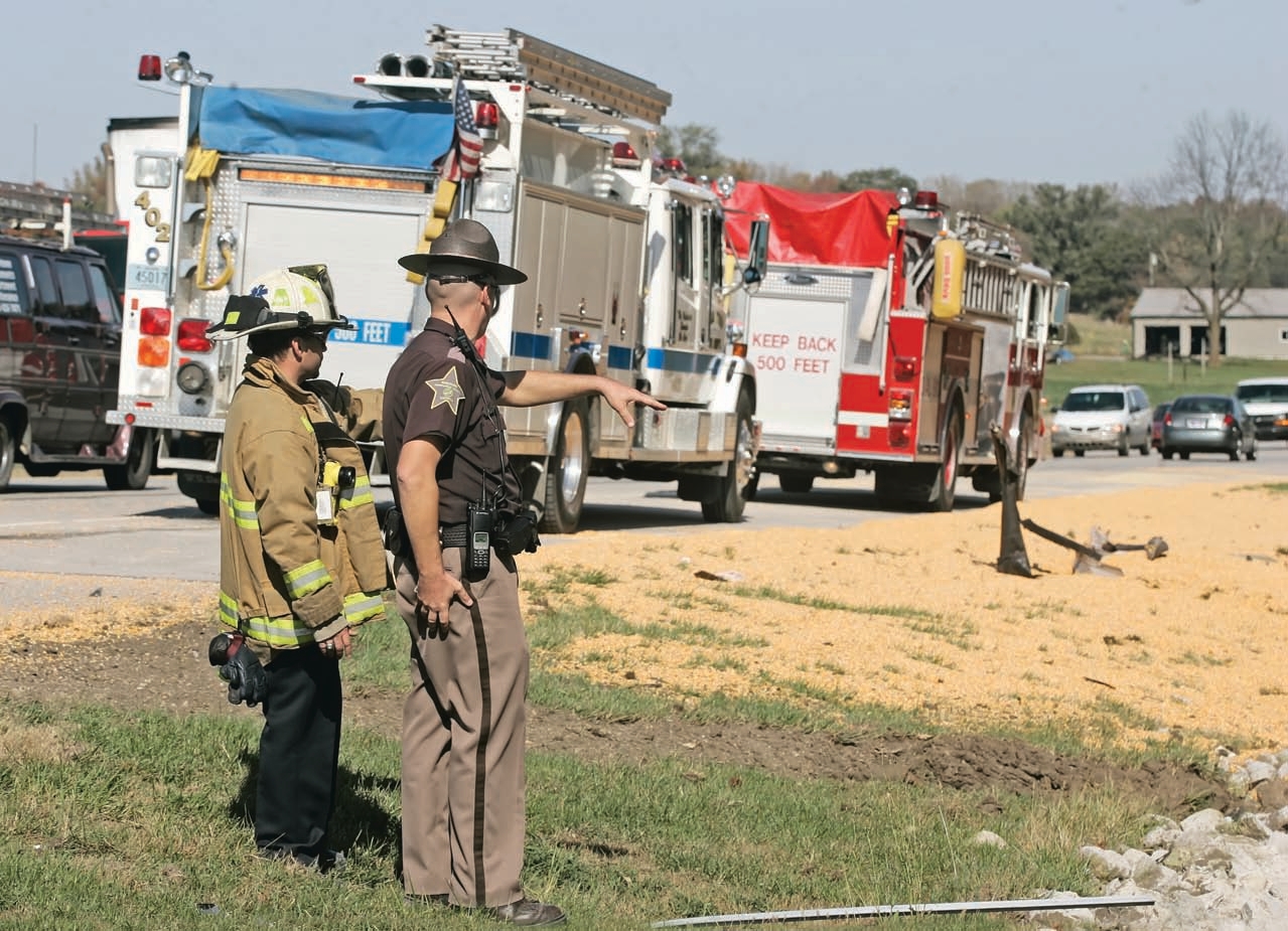sheriff inspecting the crash site