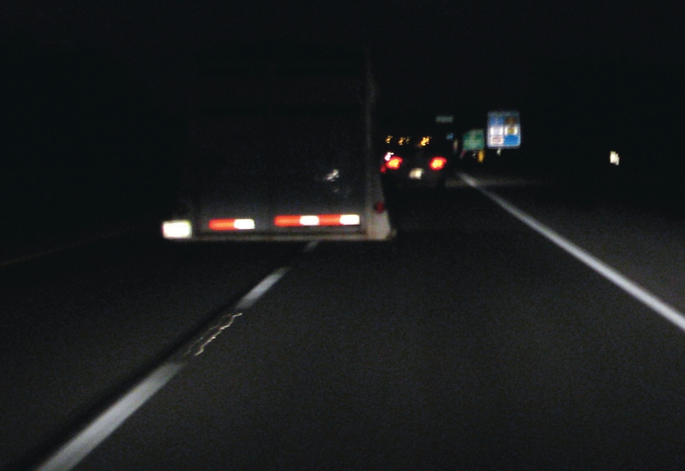 It isn’t always enough just to mark the bottom of a trailer with reflective tape. Notice how much more visible the vehicle is that has reflective tape on all sides.