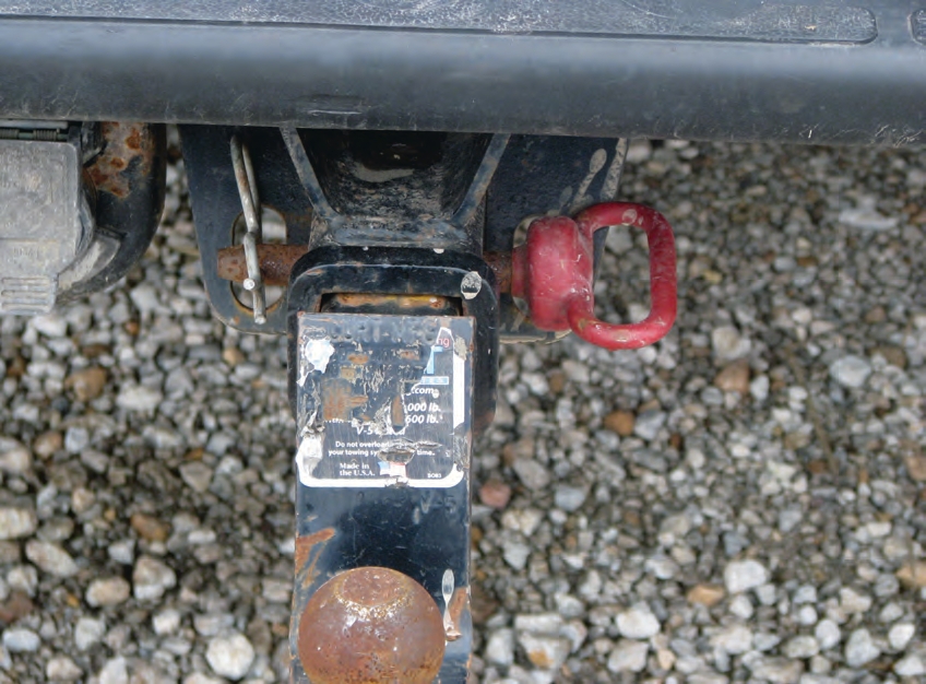 It is acceptable to use a tractor hitch pin, such as a grade 5 or 8 5/8-inch pin.