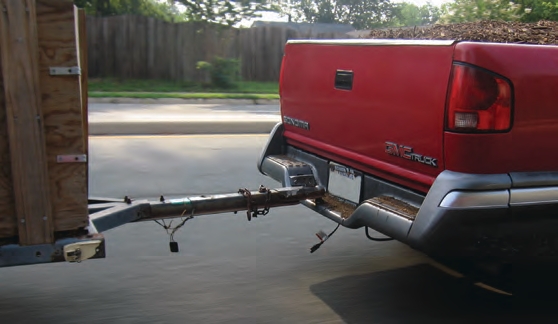 This truck is pulling a trailer without safety chains, plus the lights and brakes are disconnected.