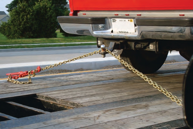 Never use a hitch to hold down a load.