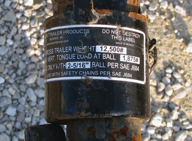 When fully loaded, the tongue weight on the truck’s hitch is 1,875 pounds. It also requires a 2 5/16-inch ball. Compare the gross and tongue weights to the ratings of the truck, receiver, and insert.