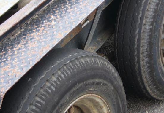 If this trailer were involved in an accident, a lawyer could easily argue that the owner was negligent by putting tires like these on the road.If this trailer were involved in an accident, a lawyer could easily argue that the owner was negligent by putting tires like these on the road.