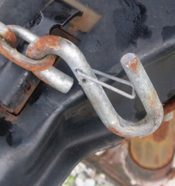 Make sure that spring-loaded latches can completely close or they become ineffective.