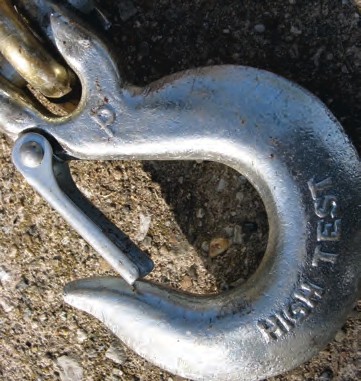 Make sure that spring-loaded latches can completely close or they become ineffective.
