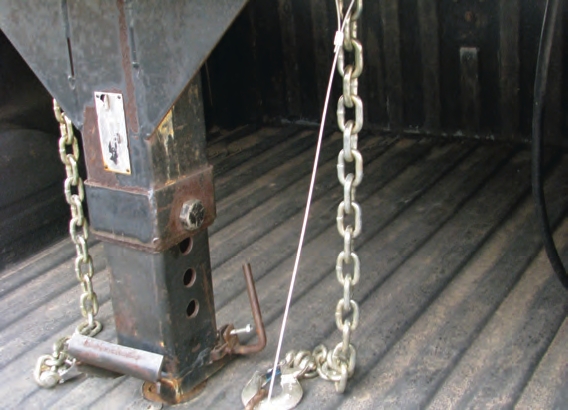 Safety chains on a gooseneck trailer do not have to be crossed, because they are just the right length to keep the trailer from exiting the bed of the truck.