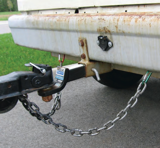 The benefits of properly criss-crossing a quality chain can be negated by having flimsy clips attached to the chain and bumper.