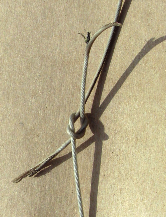 Do not tie two parts of a broken cable together. If a cable breaks, replace it.