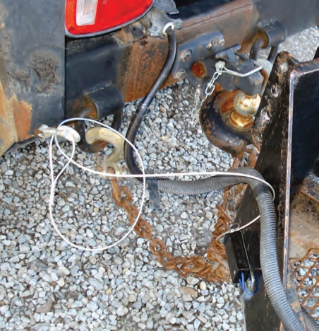 This emergency brake cable has too much slack, which means the brakes will not engage as quickly if the safety chains fail.