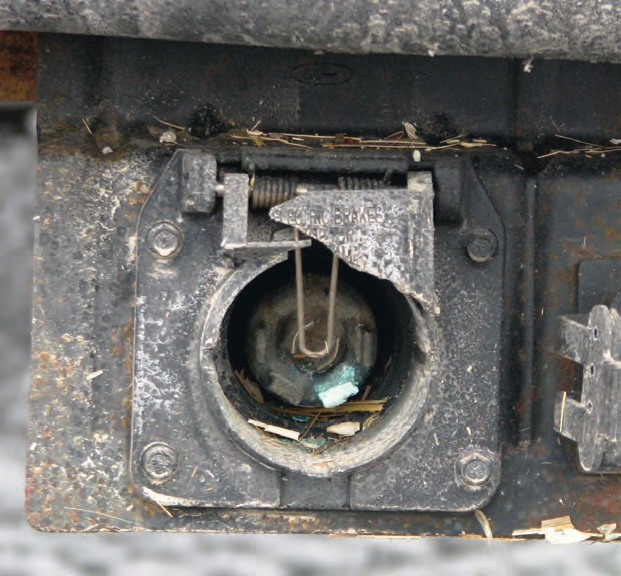 Broken covers or split wire housings can lead to brake and light failures.