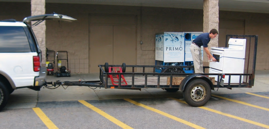 person loading a trailer