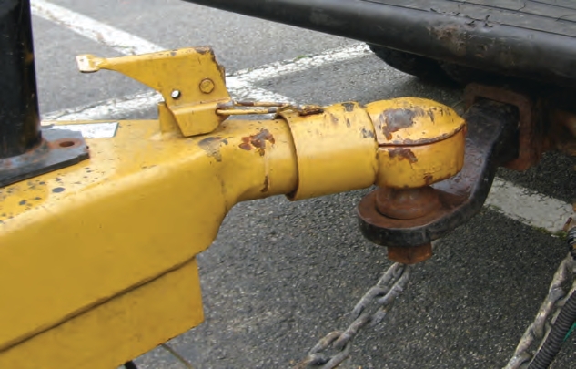 On this trailer the coupler latch pin is not in place.