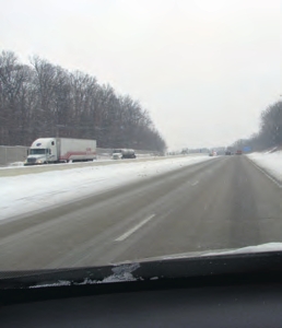 Slow down when road conditions become dangerous. Drivers can lose control of trucks when trailers start sliding on ice and snow.