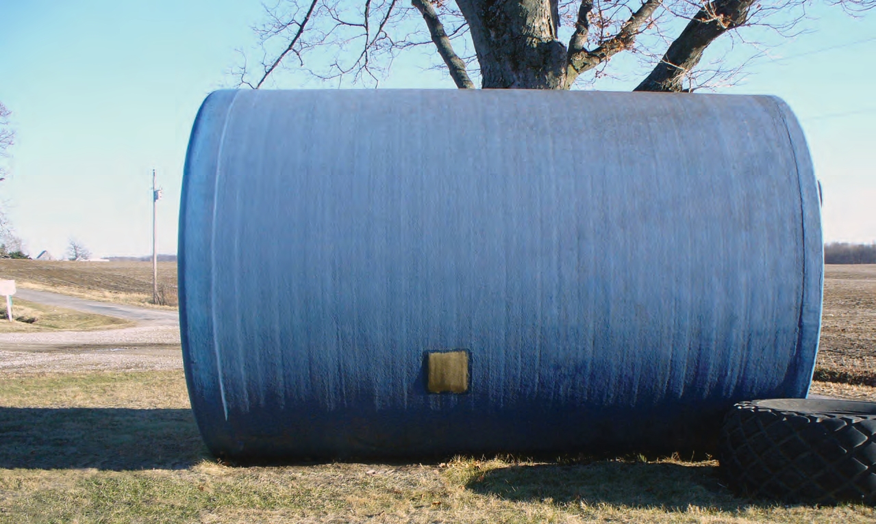 A simple fiberglass repair. Painting over the fiberglass patch would have helped protect it against ultraviolet light.
