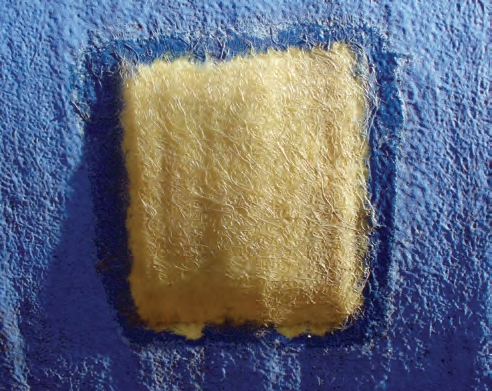 Painting over the fiberglass patch would have helped protect it against ultraviolet light.