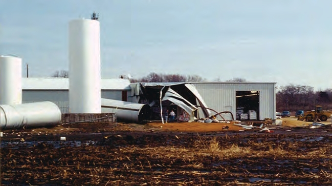 Show caution when buying used tanks because there is a lot at stake. These two, 40,000-gallon tanks failed. One of the tanks damaged a nearby building as it fell. Saving a few dollars up front might cost you a lot more in the long run.
