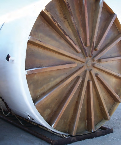 The underside of this dish-bottom tank has a 3- to 6-inch slope to the center, which allows its contents to be fully drained.